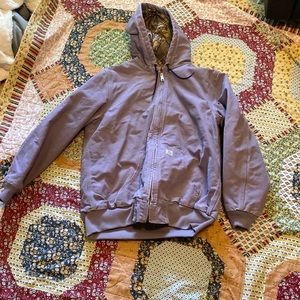 Purple hooded Carhartt coat with camo lining and pockets